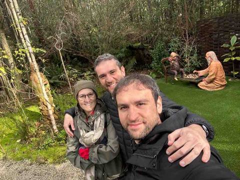 Memories, Healesville, three people taking a selfie in a garden with lawn statues