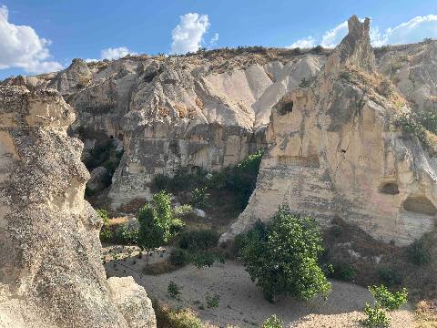 Goreme, Goereme — natural rock formations with cave dwellings in a desert landscape