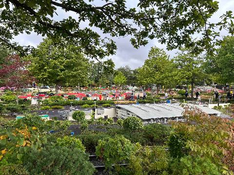 a miniature model park with buildings made of plastic construction blocks